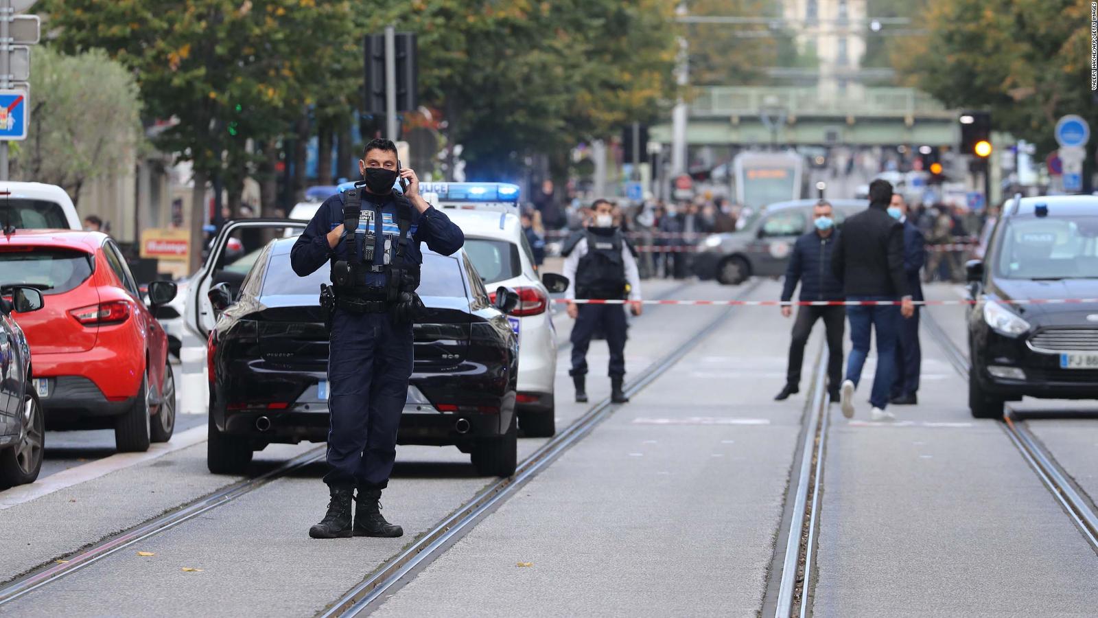 French policemen stand guard a street after a knife attack in Nice on October 29, 2020.